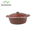 cocotte / batterie de cuisine ovale / ronde en fonte avec couvercles et oreilles